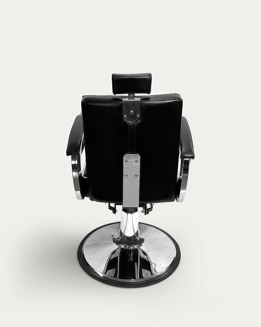 Sillón barbero antiguo con tapicería negra y base cromada Milo