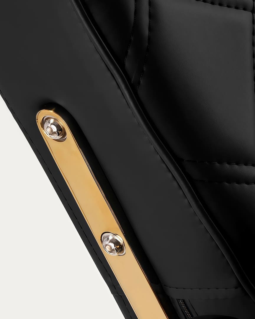 Sillón barbero dorado y negro Gabbiano detalles dorados