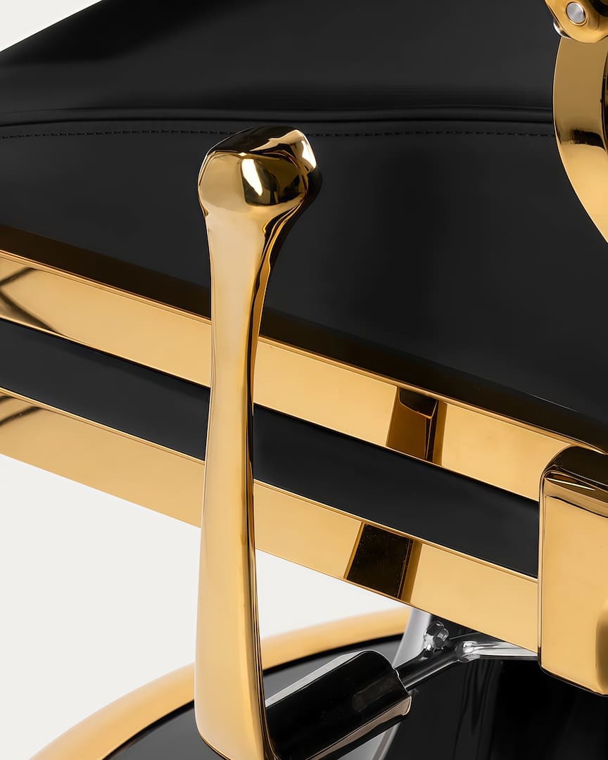 Sillón barbero dorado y negro Gabbiano palanca respaldo