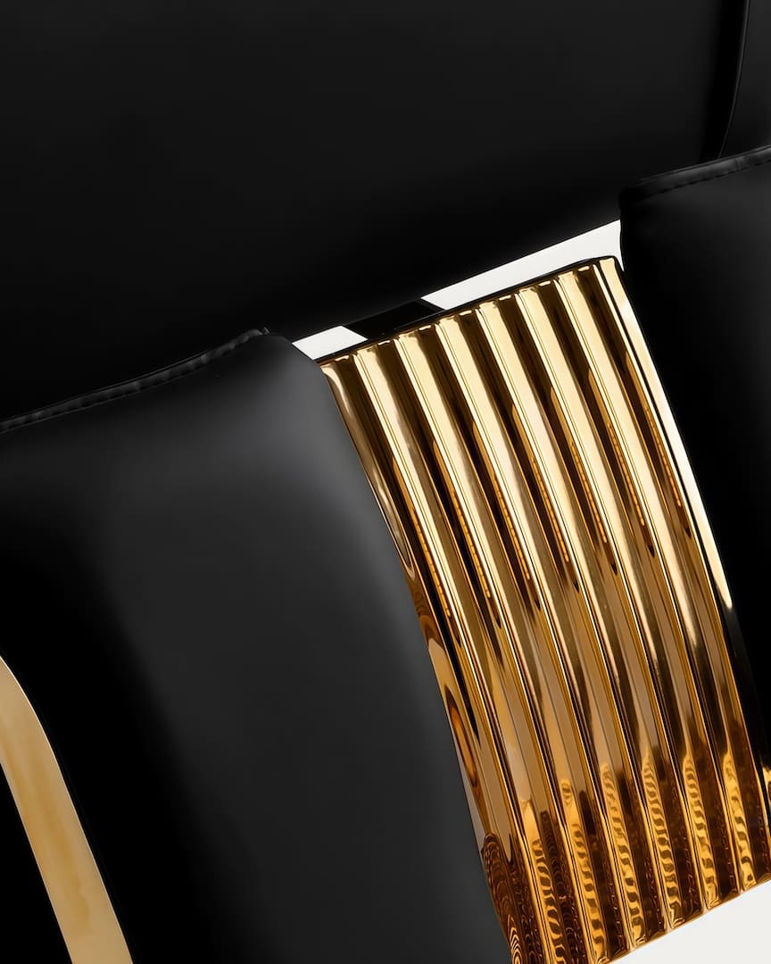 Sillón barbero dorado y negro Gabbiano reposapiernas